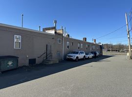 711 Broadway Industrial Trade Building with In-Place Dry Cleaner Income