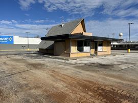 RETAIL LOT WITH BUILDING  NEXT TO WALMART