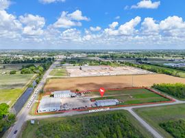 Dual Warehouses Near Hwy 90 with Surplus Land and Office