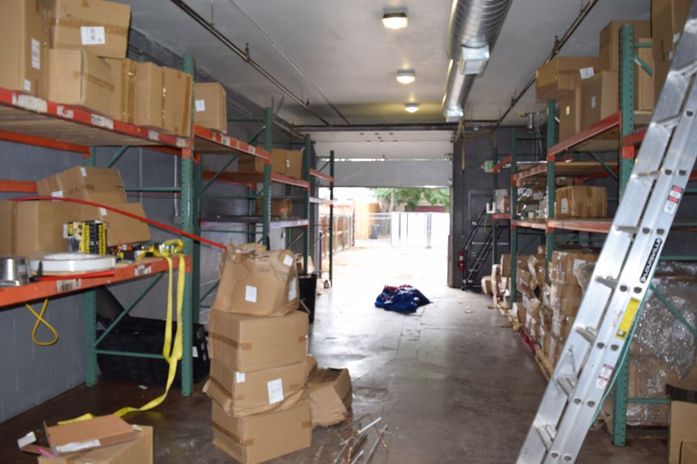 1,500 SF free-standing office/warehouse with small yard.