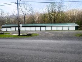 Mixed-Use Opportunity: Rented Storage Units + Large Main Building