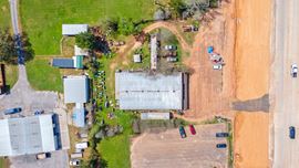 Prime Commercial Opportunity Development Site | 6,000+ Sq Ft Building, Highway 105 Frontage | Cleveland, TX