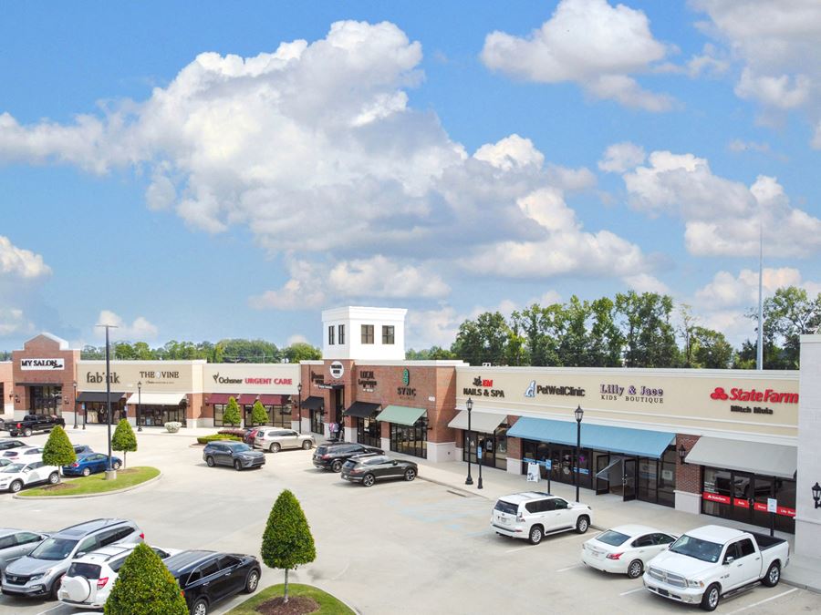 Highland Park Marketplace: Upscale Grocery Anchored Retail Center