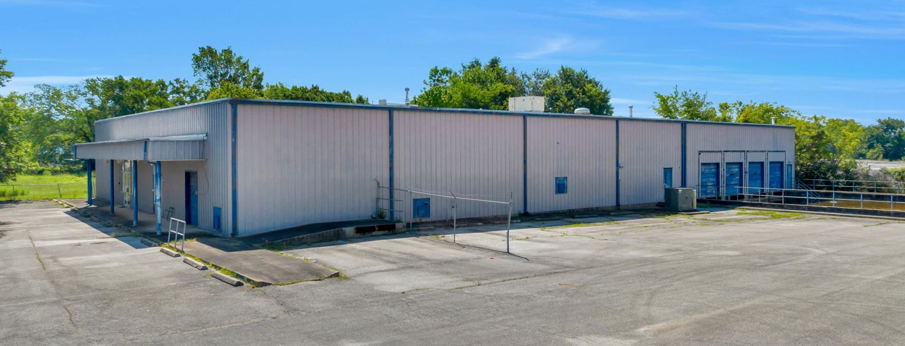 1 AC Commercial Lot with 15,454 SF Multi-Use Service Building