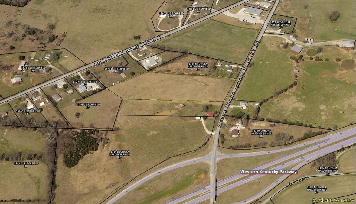 WK Parkway Opportunity with Unmatched Visibility and Versatility: Prime 5.9+/-Acre Commercial Lot with B-1 Zoning