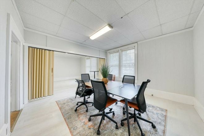 SALE OR LEASE:  Incredible commercial office or residential building with additional development potential, a brief walk from all downtown Thomasville