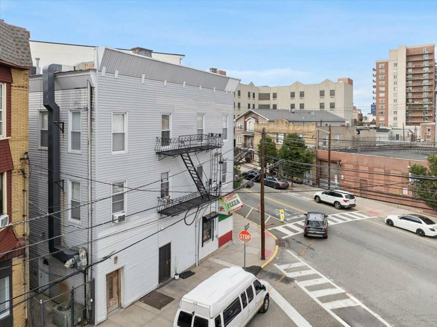 Turnkey Resi-Retail Corner Property – 7 Units, 100% Occupancy, Steps from Hoboken & NYC Transit
