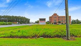 1.56 Acres on FM 1960 W – Prime Frontage & High Traffic Exposure