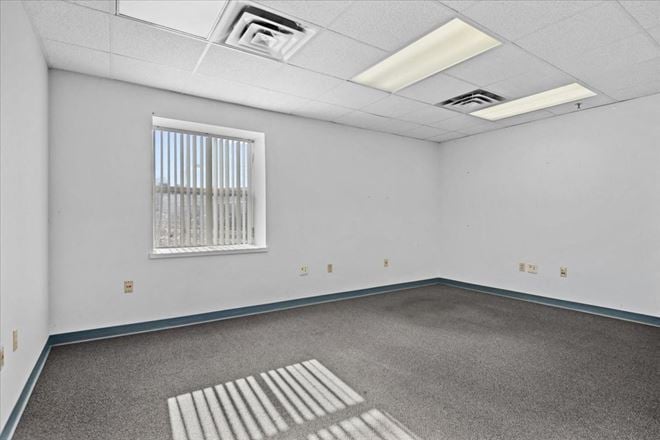 Freestanding Office/Flex Facility with Loading Docks, Secure Yard, & Expansion