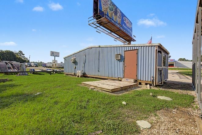 Commercial Investment & Redevelopment Opportunity | Approximately 600' of Highway 105 Frontage | Owner Financing Available
