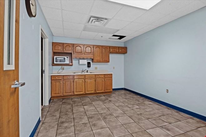 Freestanding Office/Flex Facility with Loading Docks, Secure Yard, & Expansion