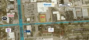 RETAIL LOT WITH BUILDING  NEXT TO WALMART