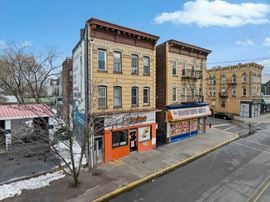 Triple Net Mixed-Use Income Property