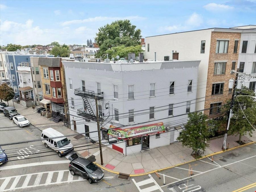 Turnkey Resi-Retail Corner Property – 7 Units, 100% Occupancy, Steps from Hoboken & NYC Transit