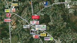 ±44,000-SF and ±25,600-SF Buildings on ±10.83 Acres at a Signalized Intersection