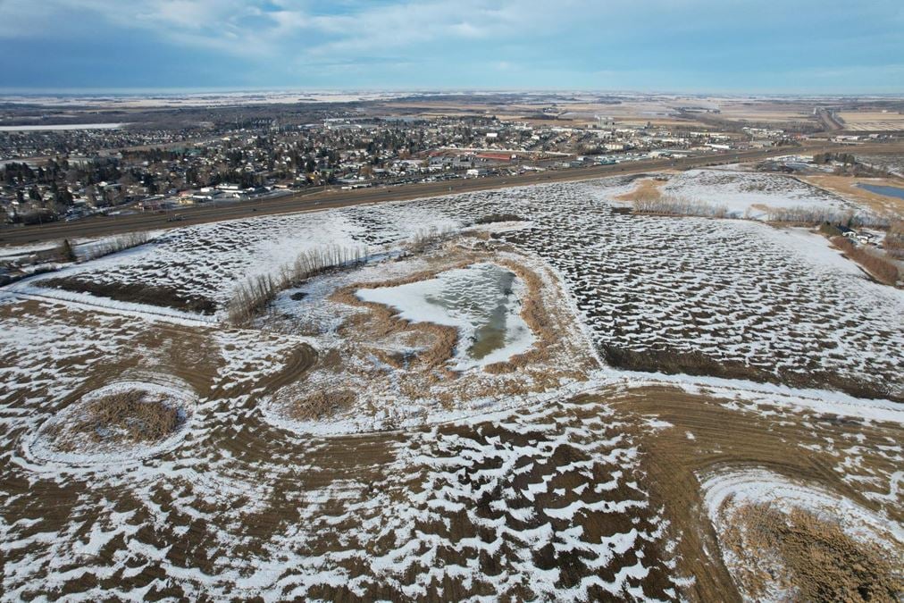 AUCTION 464- FARMLAND - RED DEER COUNTY, AB - 140 ACRES IN QE2 CORRIDOR