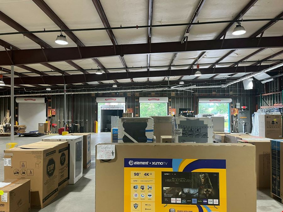BrandsMart Warehouse (Vacant) & Billboard
