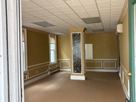 For Sale: Mixed-Use Retail/Office + 4 Apartments