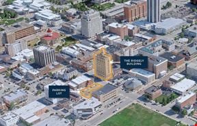 $1 Auction | 57,185 SF Office Building + Vacant Land – Illinois