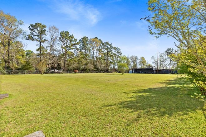 Mixed-Use Property For Sale | Residential Home + Workshop on Spacious Acreage