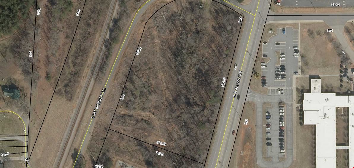 4+ Acres on Hwy 221 across from HighSchool