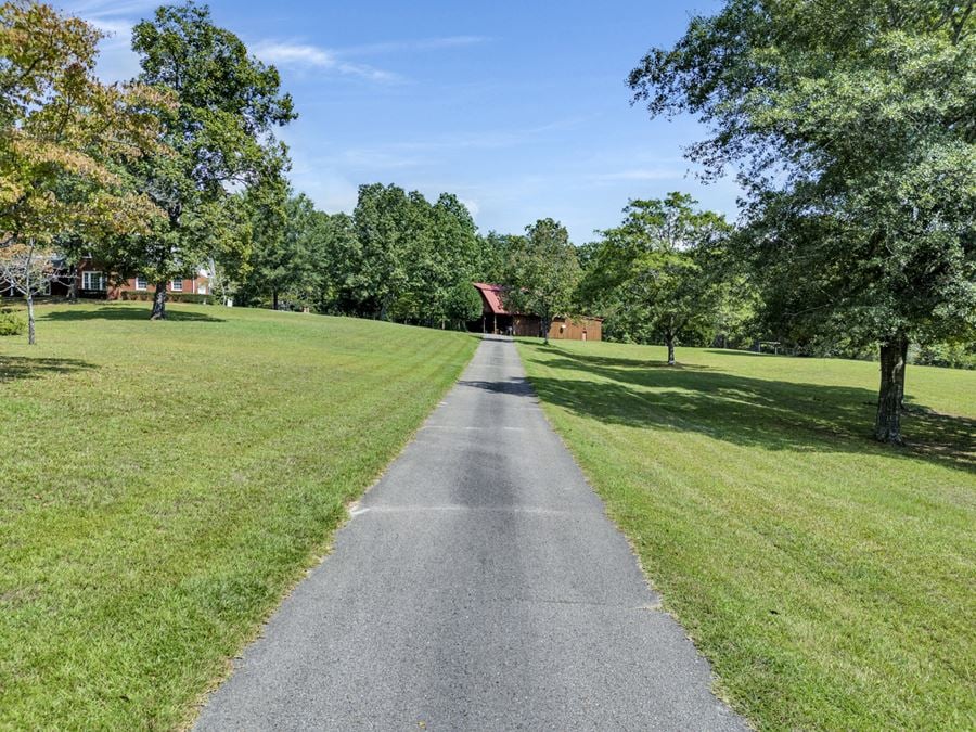 Custom Home on 13 acres with barn offers potential for AirBNB, Venue, Full Time Residence.