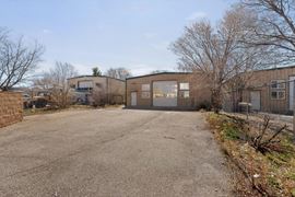 RARE WAREHOUSE WITH GATED & PAVED YARD