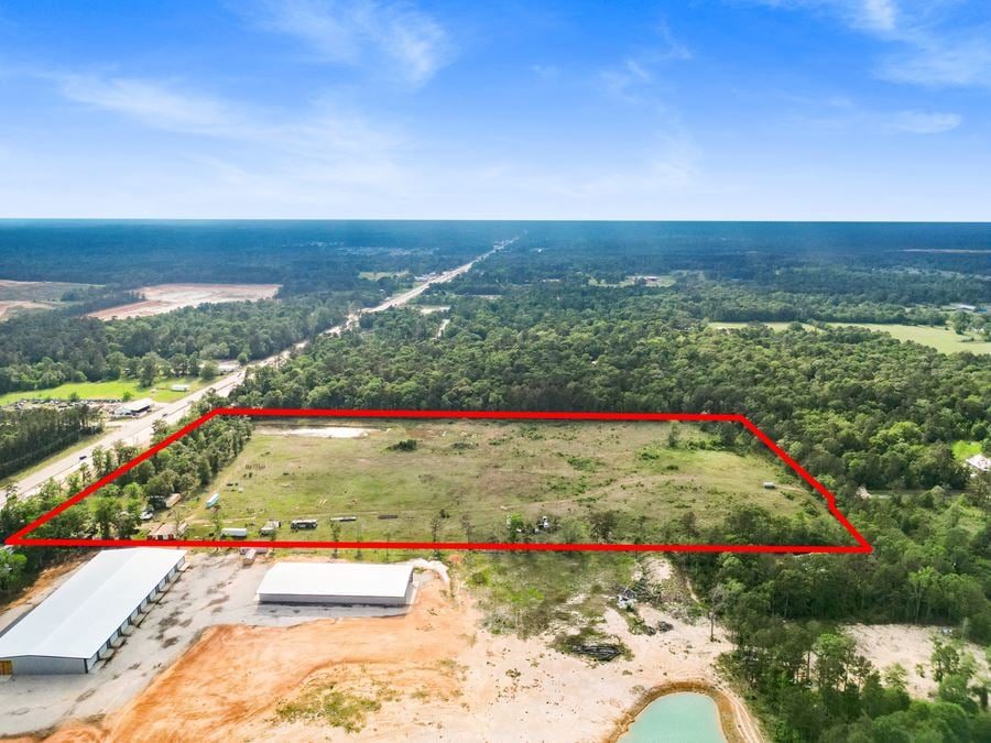 Expansive 23-Acre Tract on High-Traffic Hwy 105 – Prime Development Opportunity with Seller Financing Available