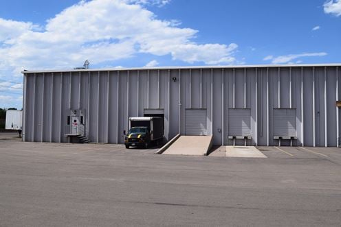 20,864 SF warehouse with dock high and drive-in loading doors for sublease