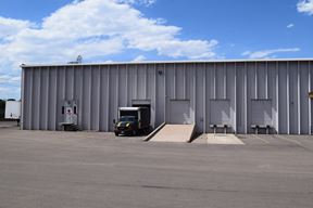 20,864 SF warehouse with dock high and drive-in loading doors for sublease