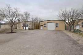 RARE WAREHOUSE WITH GATED & PAVED YARD