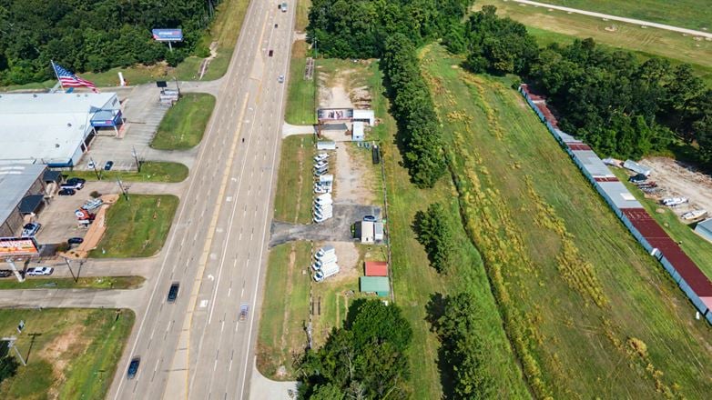 Commercial Investment & Redevelopment Opportunity | Approximately 600' of Highway 105 Frontage | Owner Financing Available
