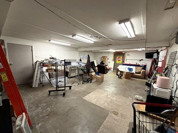 Retail Property with Open Showroom Near Hy-Vee For Sale
