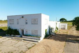 Willie Wilson Building + 4 Acres