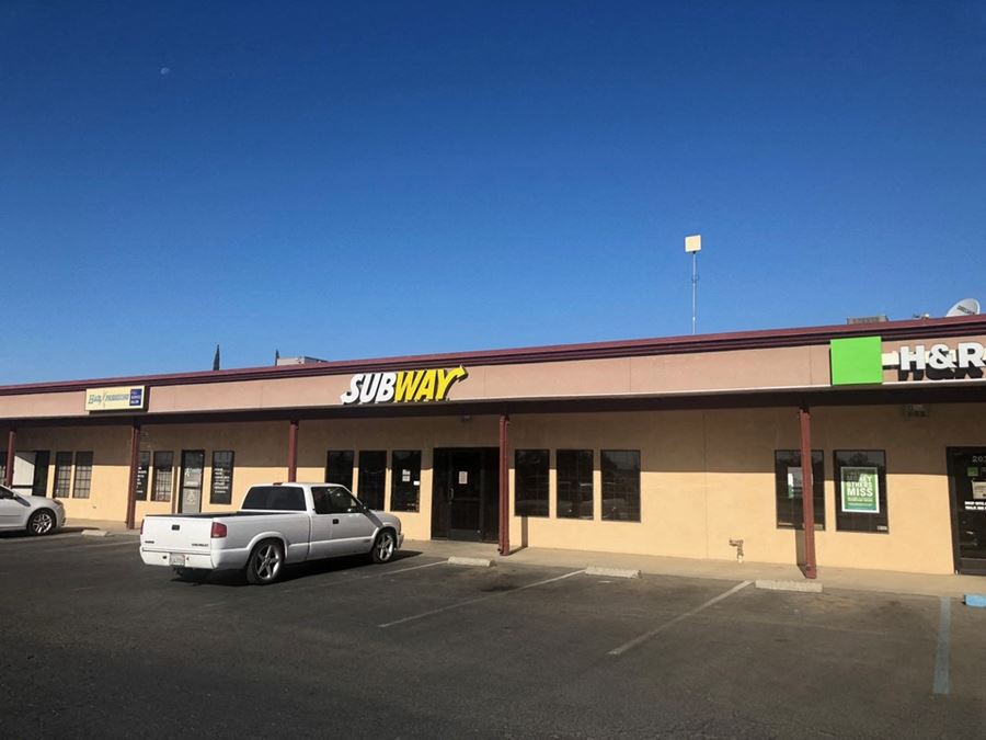 Two Spaces Available in Armona Shopping Center off HWY 198