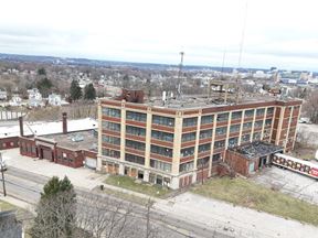 $1 Auction – 97K SF | Self-Storage Entitled | $1.75M Federal Historic Tax Credits