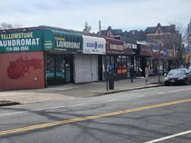 7143  / 7155 Yellowstone Boulevard Fully Occupied Retail Corner Stores Significant Income & Development Opportunity Next to Bus Stop!