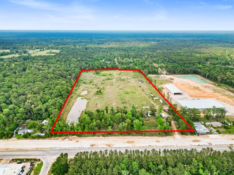Expansive 23-Acre Tract on High-Traffic Hwy 105 – Prime Development Opportunity with Seller Financing Available