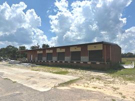 6.68 acres of Industrial Outdoor Storage (IOS) w/ Warehouse