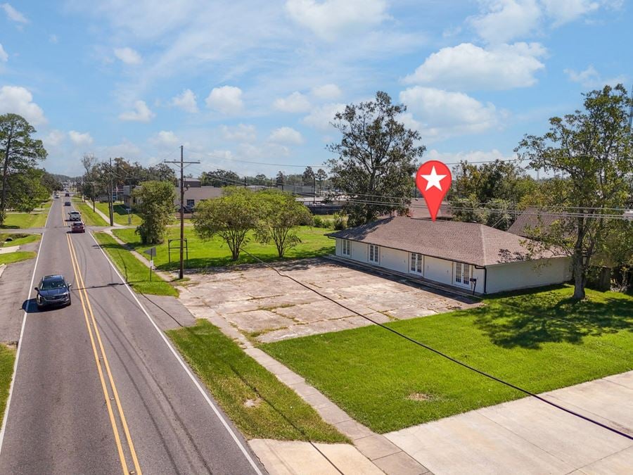 Visible Corner Office Building with Surplus Land