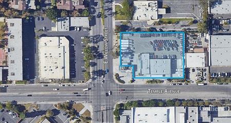 Building with Huge, Private Fenced Yard & Major Retail Exposure - Signal Hill