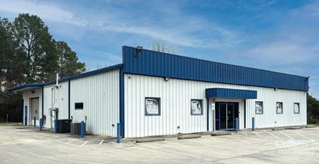 For Sale | Industrial Building on  ±1.89 acres in Tomball, TX - Tomball