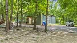 Prime Interstate-Frontage Commercial Tract – ±8.8 Acres with 3 Income Producing Building