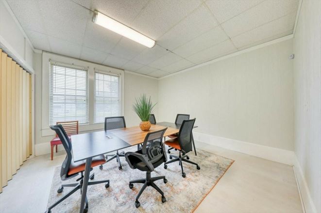 SALE OR LEASE:  Incredible commercial office or residential building with additional development potential, a brief walk from all downtown Thomasville