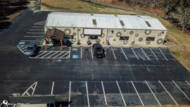 Single-Tenant Retail Building Accessible From GA-400  | ±4,000 | Sale Leaseback | NNN Lease