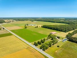 Exceptional 208+ Acre Farm with Two Residences & Premium Outbuildings