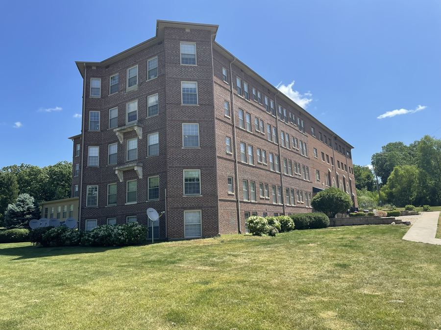 18-Unit Apartment Complex and Church