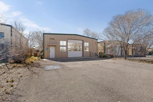 RARE WAREHOUSE WITH GATED & PAVED YARD