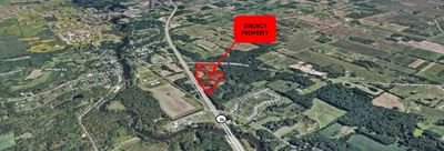 +/- 40 acres of land with Hwy 36 visibility