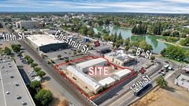±11,500 SF Of Clear Span Industrial Buildings + Fenced Lot
